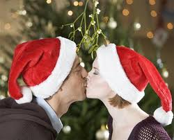 Kissing under the mistletoe.